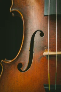Close-up of violin f-hole and body